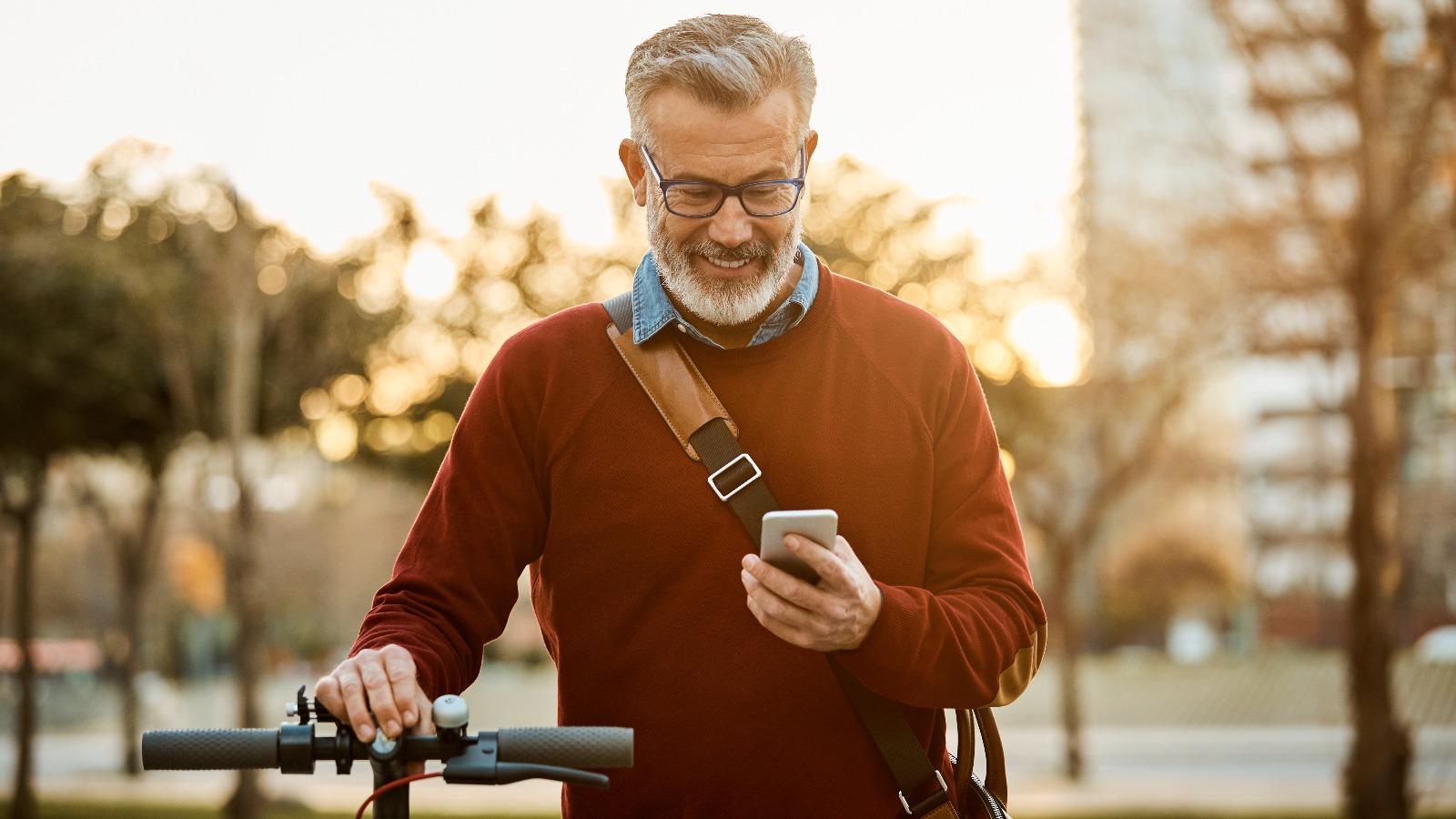 Decorative image of man on this phone in the street